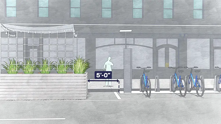 Diagram showing 5 feet of clearance between a roadway setup and a bikeshare station.