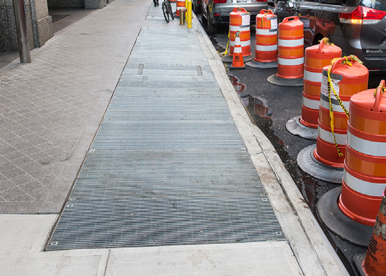 Image showing subway grates in the sidewalk at the curb.