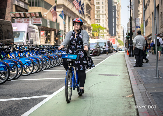 Image of a bike lane with a cyclist riding