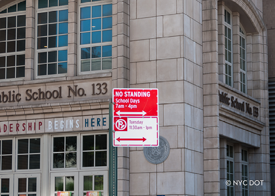 Image of a no standing during school days from 7am to 4pm sign