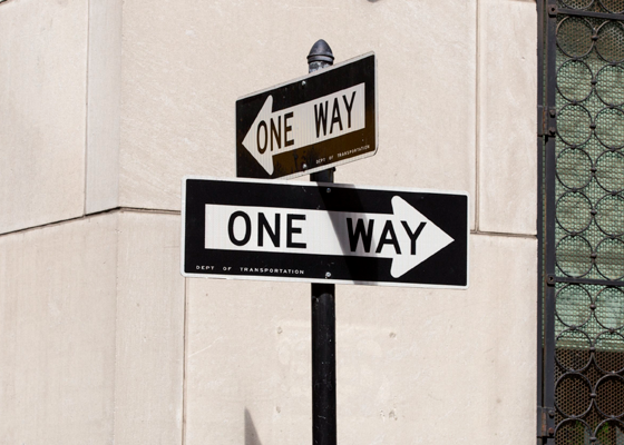 Image showing two one-way signs in different directions on a sign post