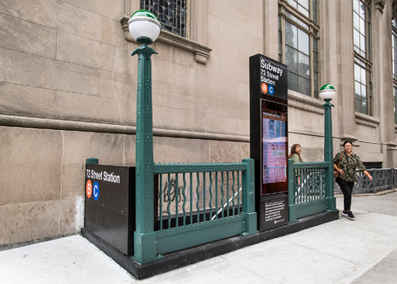 Image of an MTA subway stair located at the building line.